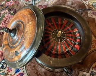 Antique travel roulette box.