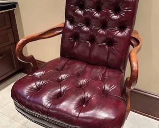 Leather Executive rolling/rocking chair.