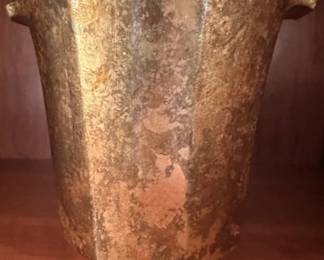Lesley Roy gold colored champagne bucket.