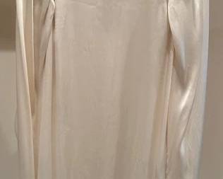 Chanel silk blouse with back and sleeve zippers.