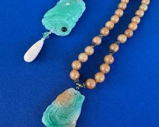 18k Jade, coral and diamond pendant, also jadite and pearl necklace.