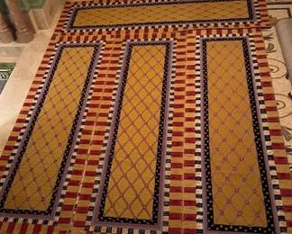 Four 30"x 95" MacKenzie Childs runners.