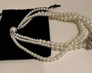 Chanel pearl choker.