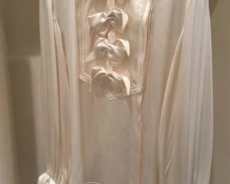 Chanel silk blouse with bows.