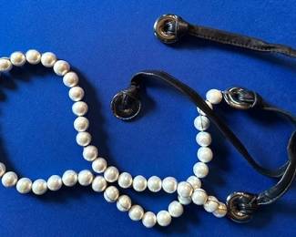 Chanel leather and pearl belt.