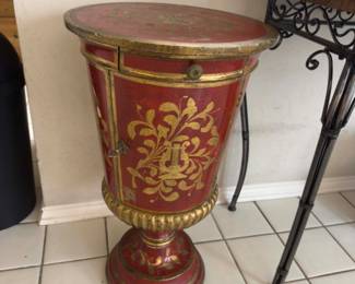 Cute small red/gold side cabinet