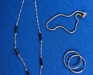 14k necklace with black coral, 14k bracelet and hoop earrings.