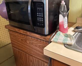 Nice smaller microwave, and the cabinet is for sale too.
