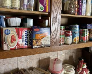 Lots of cookbooks.  And look at that adorable tupperware cake holder!