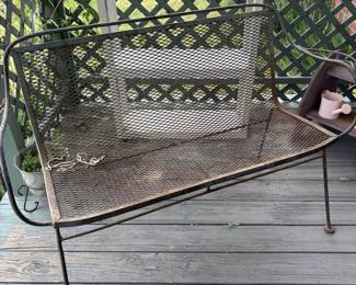 Wrought iron bench.
