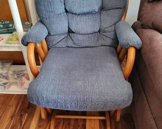 Beautiful oak glider with cushions.