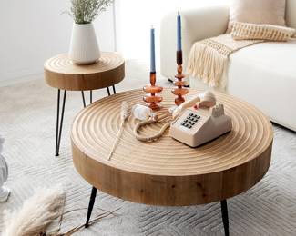 [$90] Add warmth and classic rustic charm to your bedroom or living room with this distressed cylindrical table set. Both pieces make matching colors easy with their neutral and natural wood finish ($90)