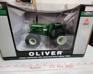 Oliver nineteen fifty tractor with terra tires and box