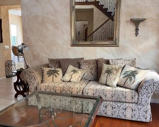 Custom upholstered sofa & glass and wood coffee table, large mirror
