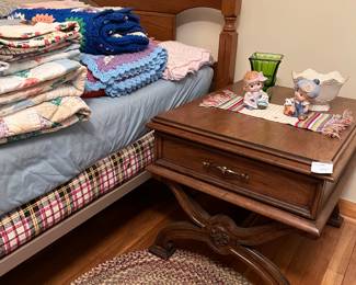 Solid wood twin bed, rag rug, night stand/end table