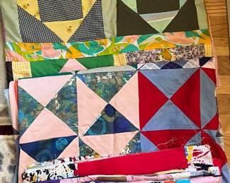 Quilt tops. Most hand sewn There are also a good many quilt squares( not shown)