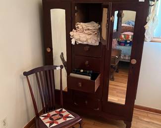 Chifforobe, ladies rocker with quilt seat , and lots of beautiful crochet doilies. All sizes