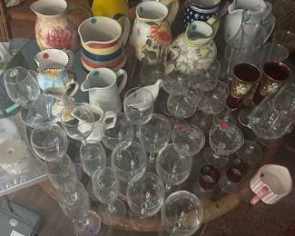 Glass ware and decorative ceramic pitchers