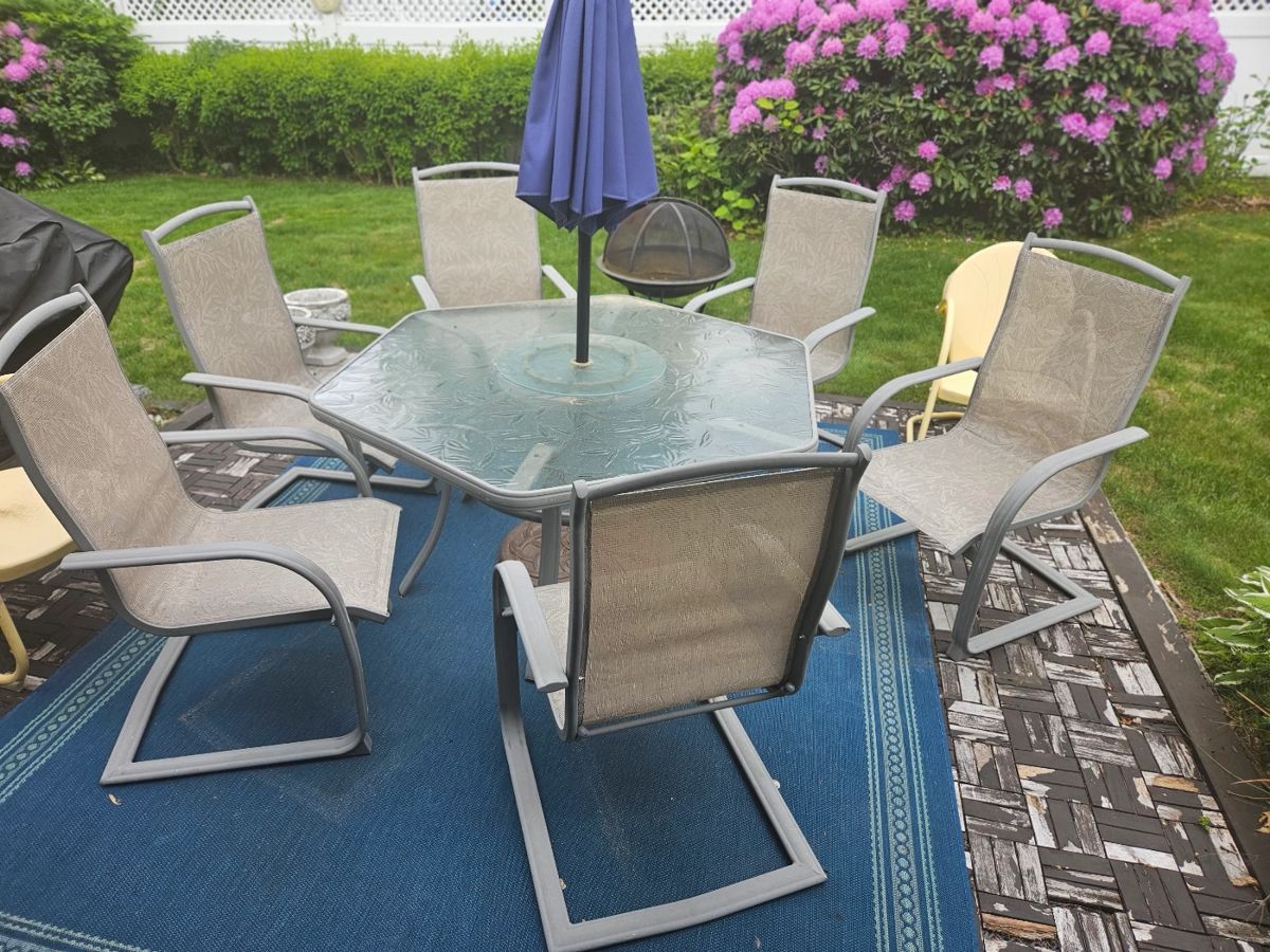 Glass Top Outdoor table with 6 chairs & umbrella