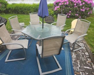 Glass Top Outdoor table with 6 chairs & umbrella