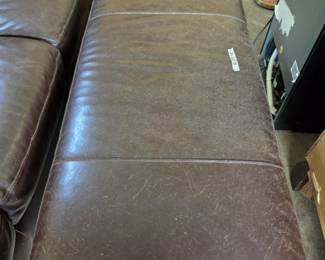 #83 Brown Leather Couch 80", Recliner, and Ottoman 46x23x18 (3 Pieces) (as is finish) $75.00