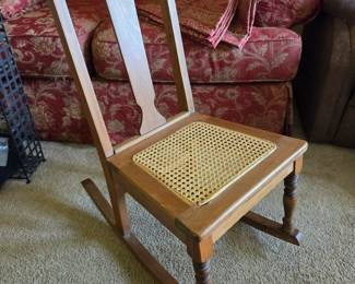 #28 Children's Wood Rocker w/ Cane Seat $25.00