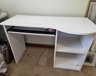 #42 White Laminate Desk 42x16x20-28 $20.00