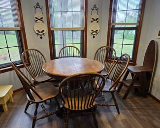 #1 Round Oak Dining Table w/ Leaf and 6 Chairs (2 are Captain Chairs) 41-59x30 (as is finish) $350.00