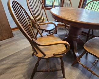 #1 Round Oak Dining Table w/ Leaf and 6 Chairs (2 are Captain Chairs) 41-59x30 (as is finish) $350.00