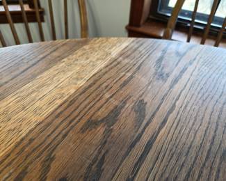 #1 Round Oak Dining Table w/ Leaf and 6 Chairs (2 are Captain Chairs) 41-59x30 (as is finish) $350.00