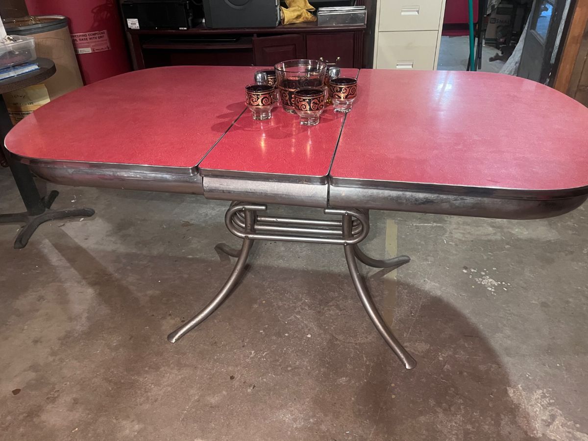 Great find! This Great 1950's Formica and Chrome Kitchen Table was found In the basement under boxes, bags, and was covered in sheets...Very Good Condition!