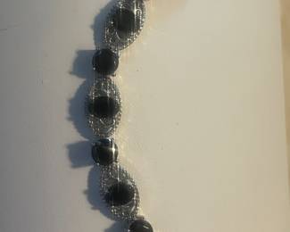 This beauty is comprised of Shungite Platinum over Sterling Silver and over 8 carats of stones
