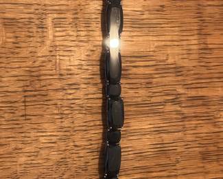 Heavy sterling silver bracelet with many Carats of black spinel.