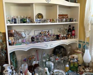 shot glass collection and travel trinkets
