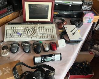 Under cabinet radio, printer, digital picture frames, key boards, mice variety of cords.