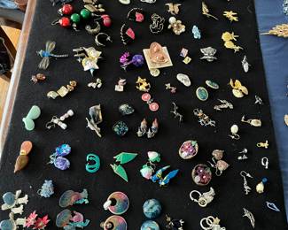 Large variety of vintage earrings.