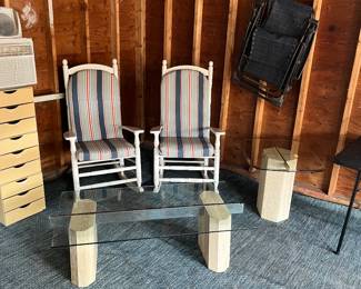 Cracker barrell rocking chairs and glass top coffee table and end table.