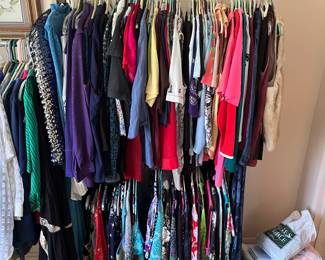 More women’s, small, medium, and large blouses, button ups, silk and linen.