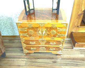 Multi drawer cabinet with doors closed.