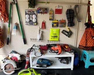 Chicago, electric hand tools, Ryobi 20 V battery operated blower and bush trimmer, Tree, limb pruner, extension cords and more.