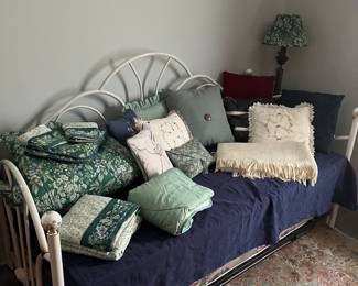 Day Bed, comforters and pillows.