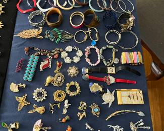 More vintage earrings, pins and bisque Bracelets.