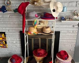 Large selection of vintage hats and hat boxes.