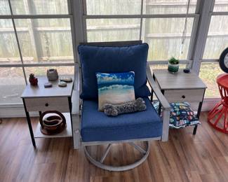 Swivel Captains chair and matching end tables.