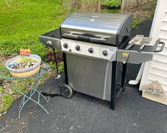 Charbroil, gas, grill and iron plant stand