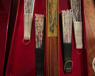 Paper hand fans with bisque handles,