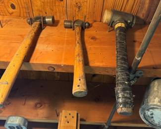 Collection of hammers used in carpentry, construction, metalworking and demolition typically to drive nails, shape metal or break materials.