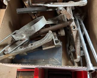 Bearing Pullers used to remove gears, bearings and other press-fit parts. Various sizes commonly used in automotive repair, machinery maintenance, and industrial settings. Also known as gear pullers or bearing extractors.