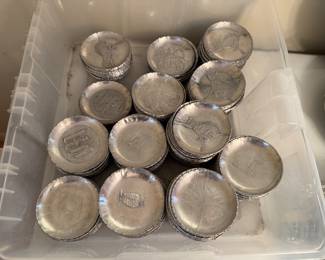 Well-known aluminum craftsman's coasters with a variety of designs available. Wrought aluminum with hammered finish. All handcrafted.