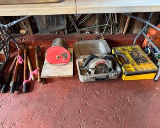 Porter-Cable 7 1/4 Heavy Duty Circular Saw with Brake. Also shown Stanley 25 compartment Shallow Pro Small Parts organizer with a variety of small parts inside and other tools.